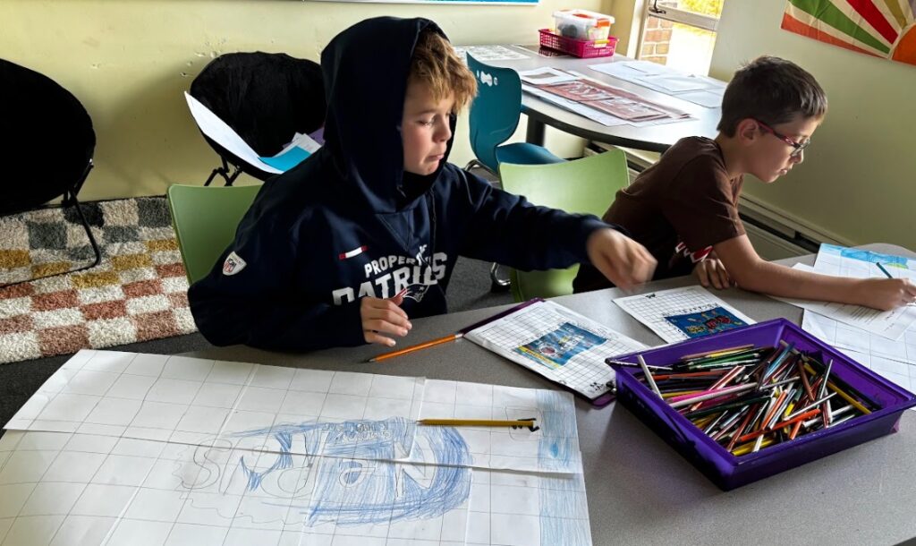 Ben Bronz students learn proportion and scale drawing larger candy wrappers 